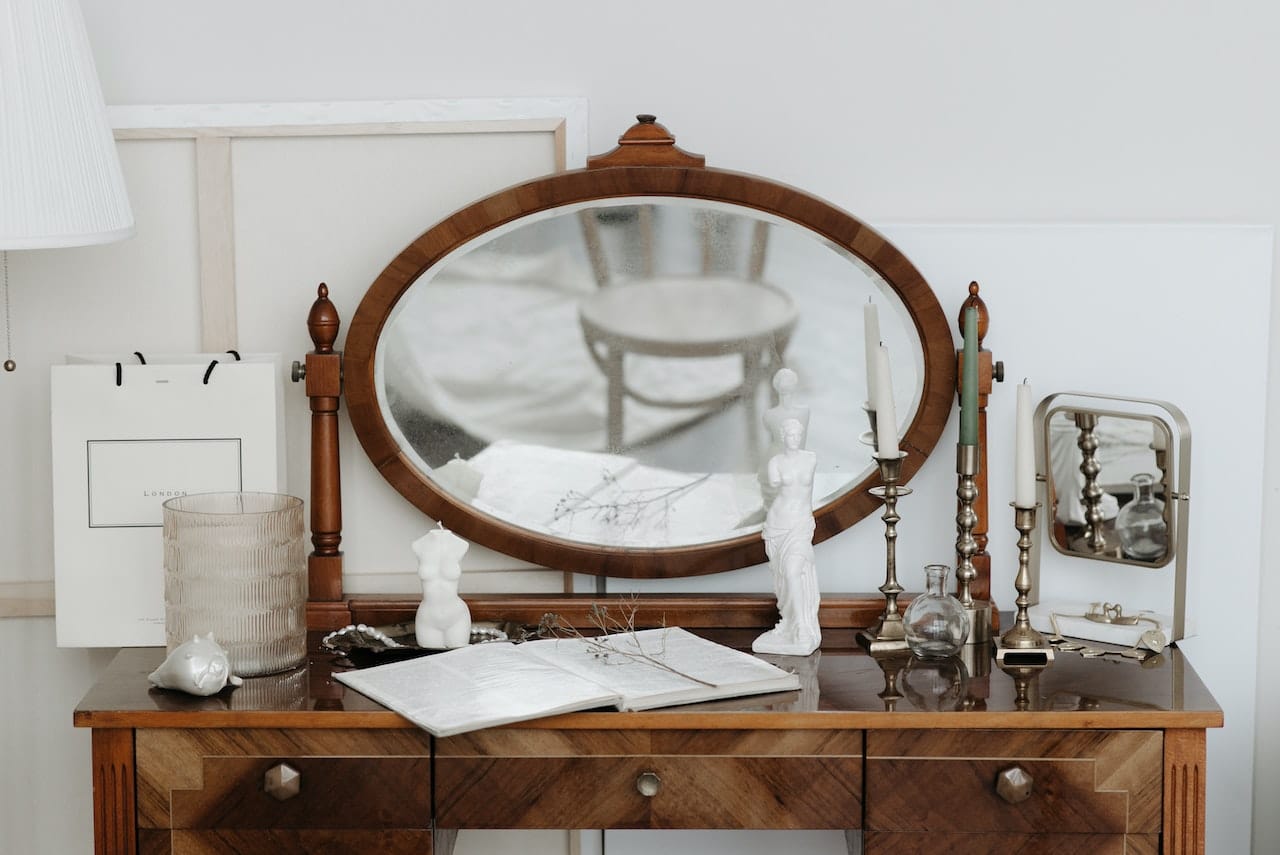 Mirror reflecting part of a chair