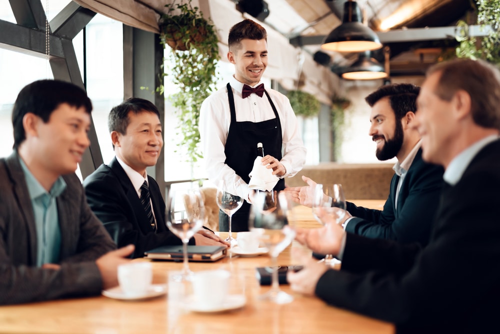 Waiter serving a table