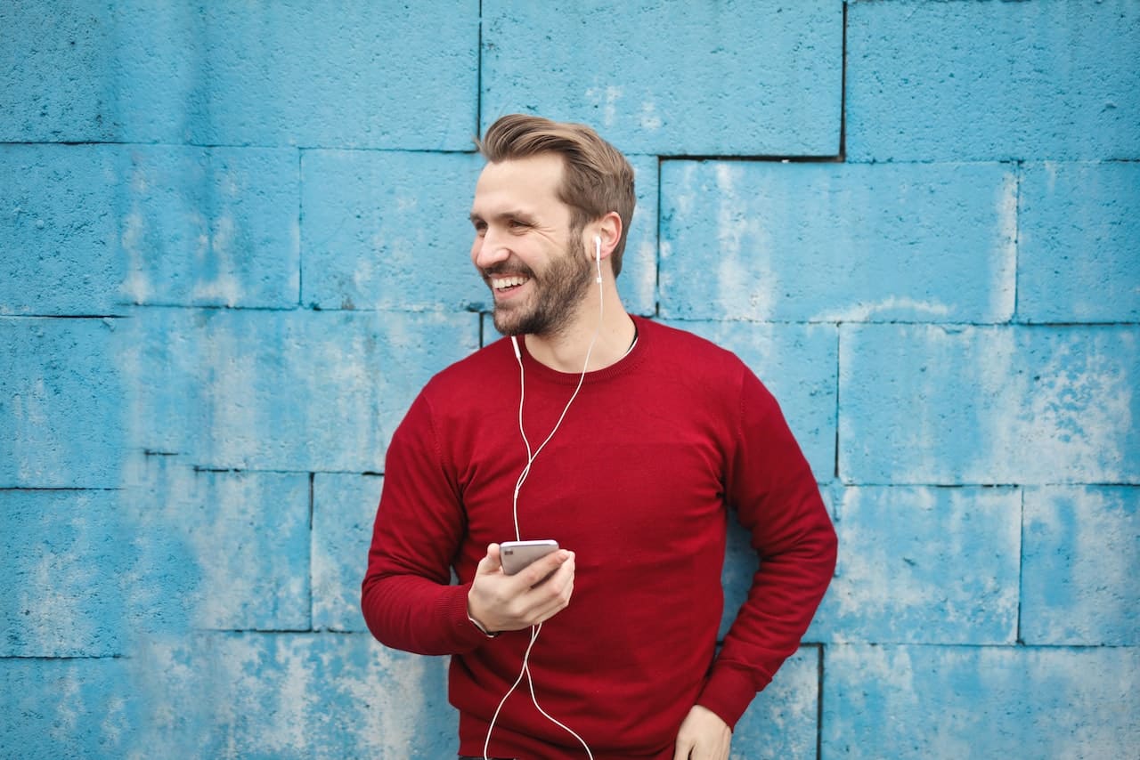 Handsome guy listening to music