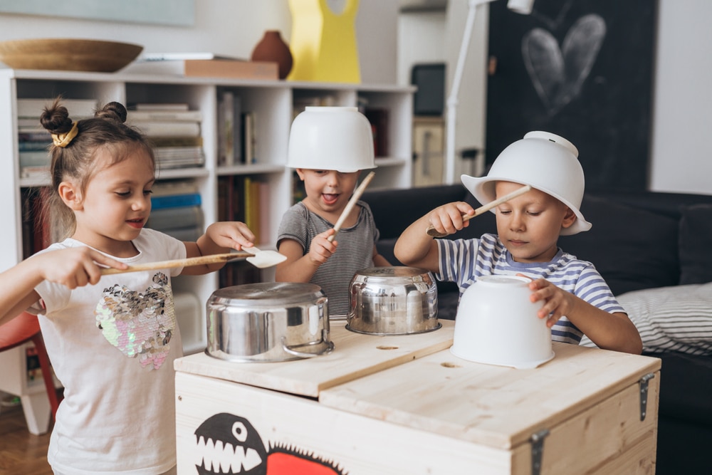 esl kindergarten students doing roleplaying