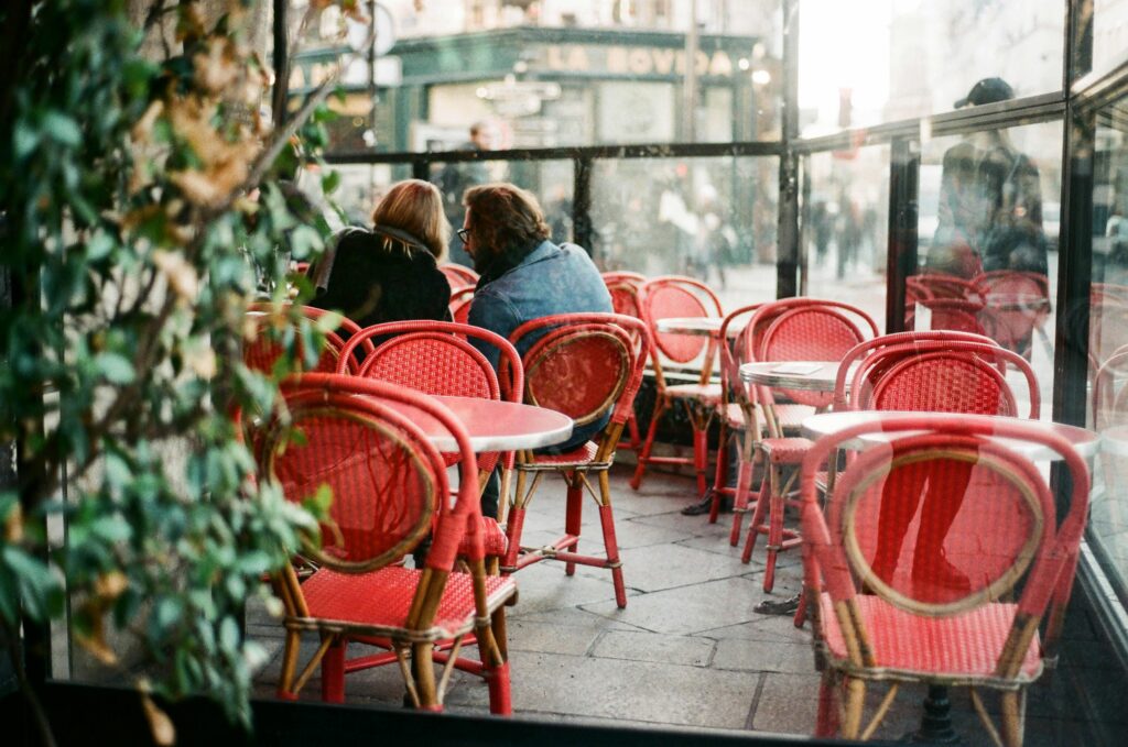 Women sitting on the terrace of a Parisian cafe