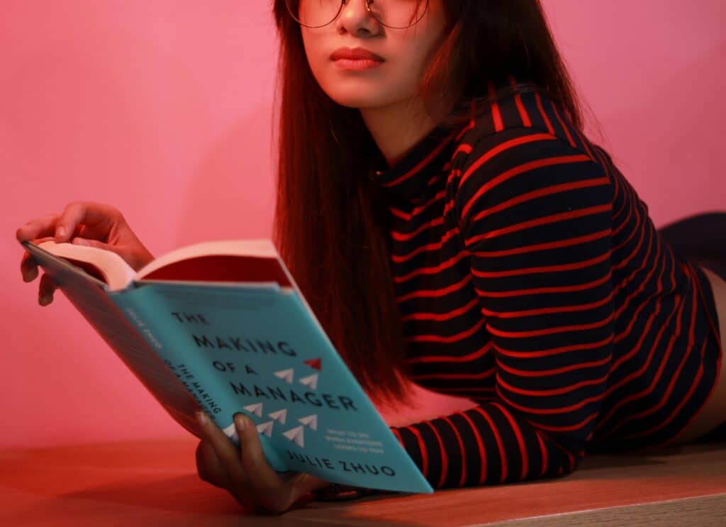 A woman reading a book.