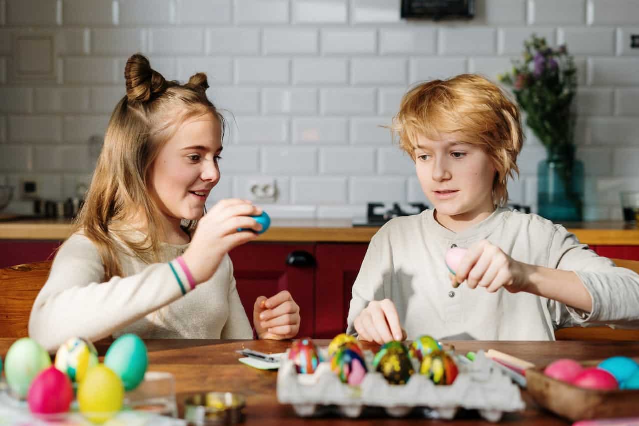 Kids painting eggs